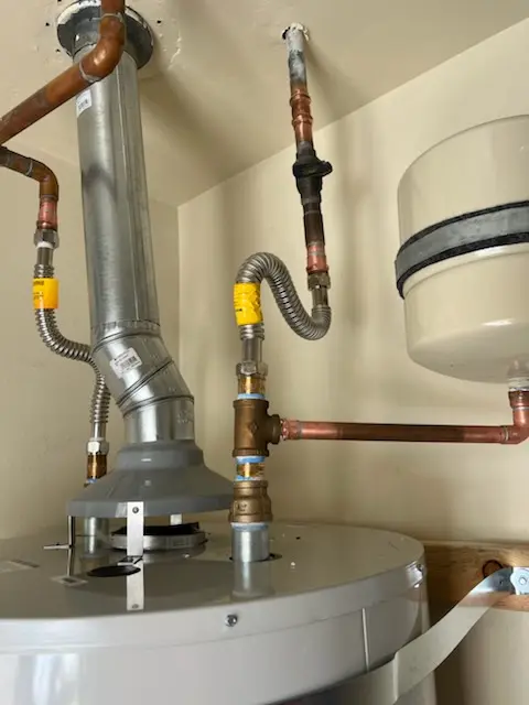 Water heater installation and plumbing repair in Tremont Park